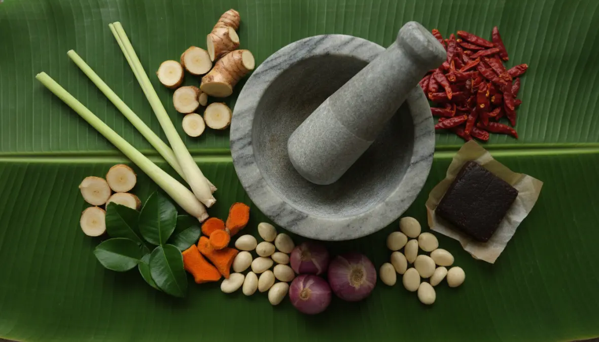 Fresh ingredients for traditional laksa curry paste and rempah spice mixture